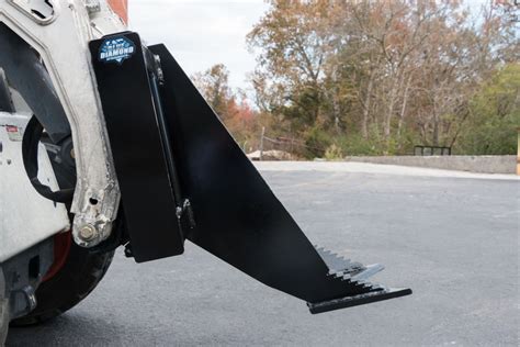 grubbing trees with skid steer|skid steer tree grubber attachment.